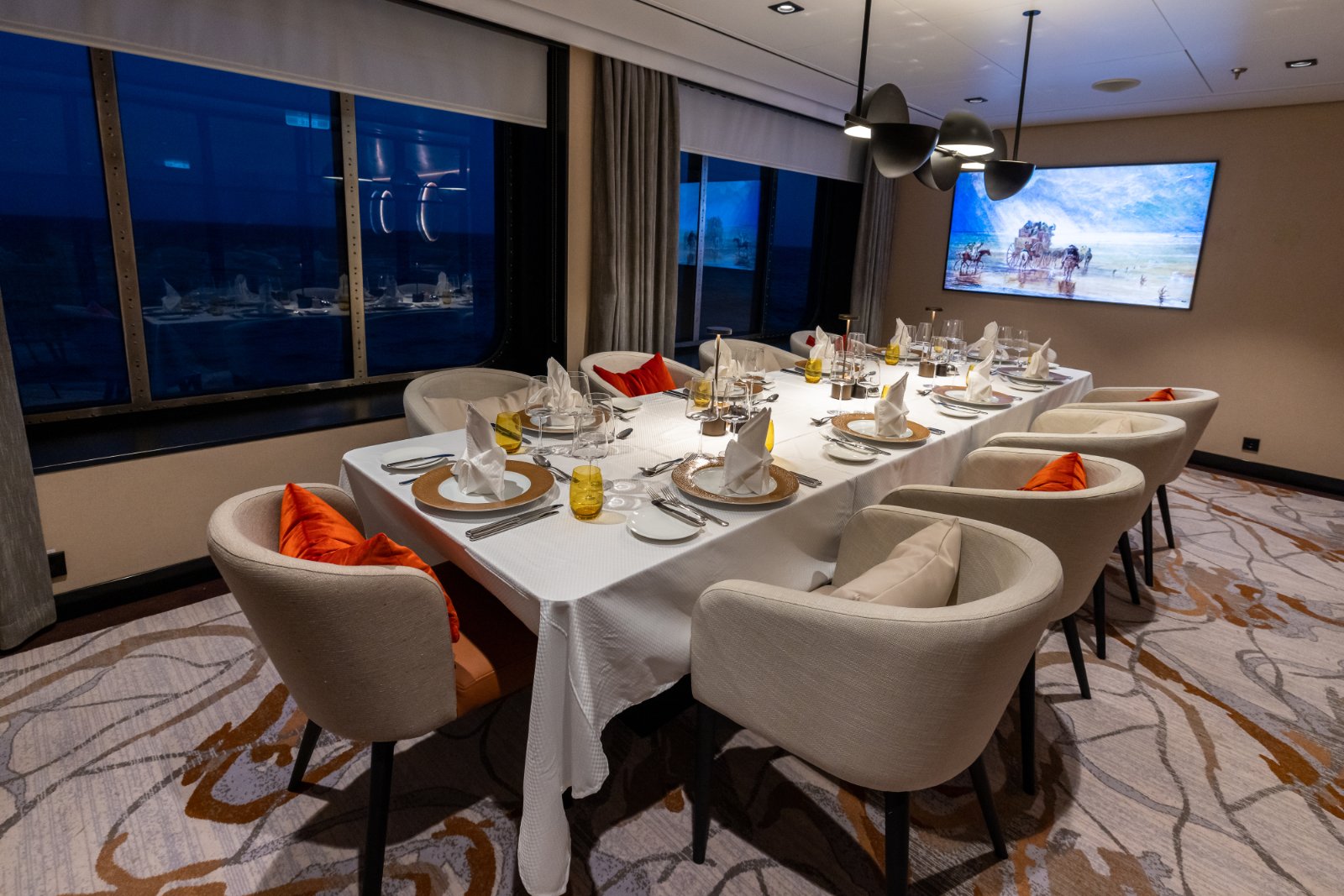 Table set for a private dinner aboard a Swan Hellenic luxury ship
